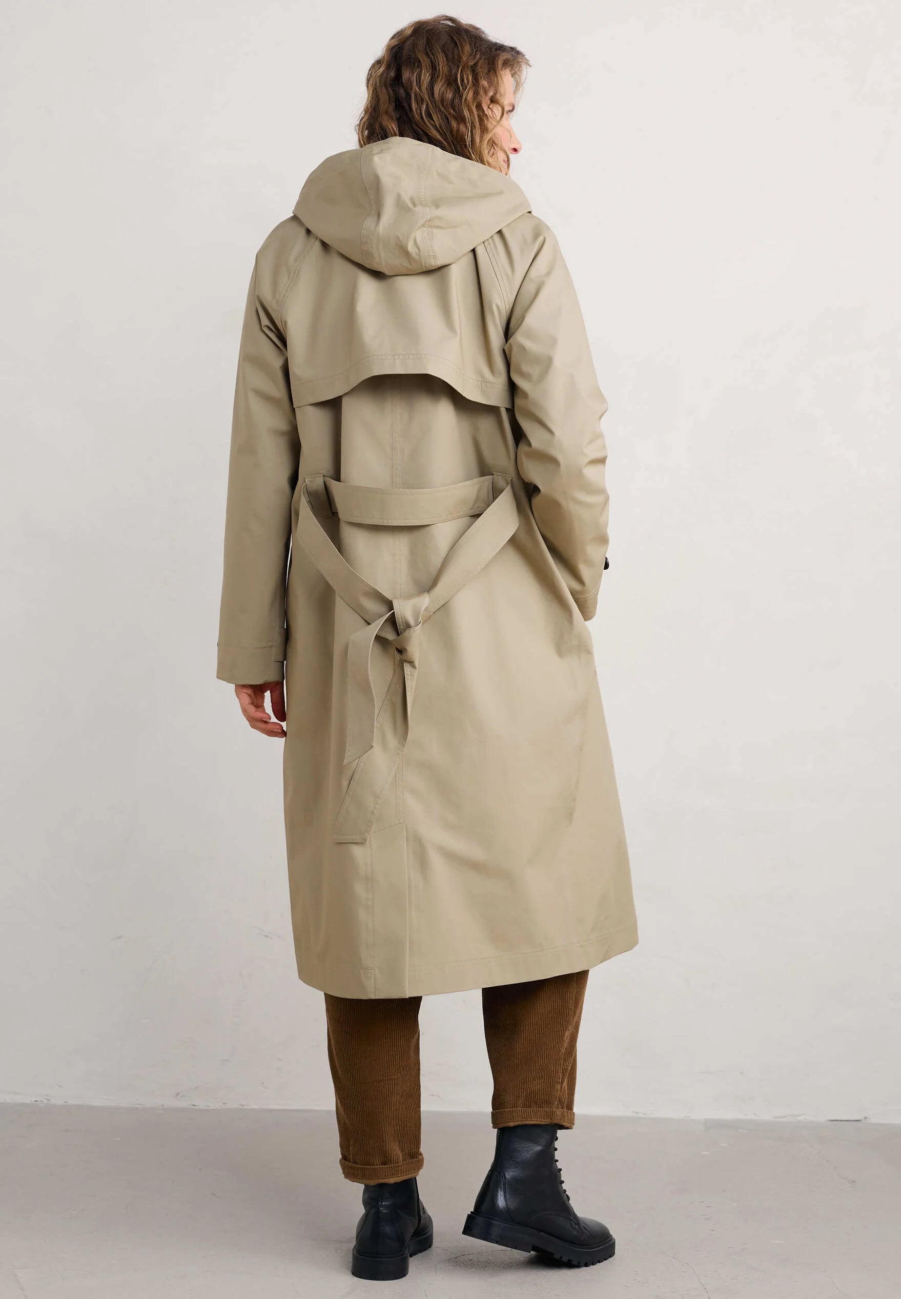 Woman wearing the Penweathers Trench Coat in natural Seed by SEASALT