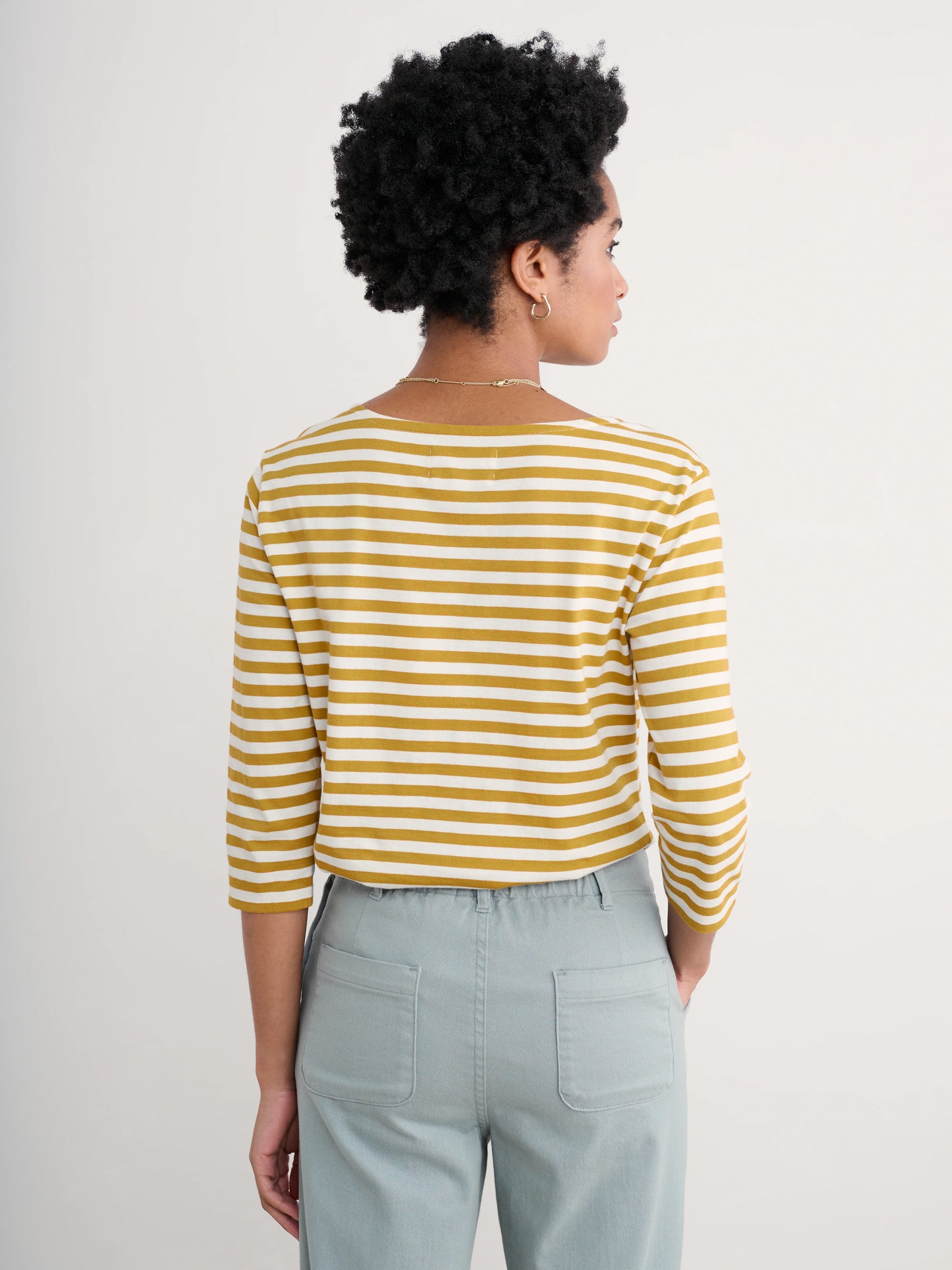 Woman wearing the Sailor cotton Top in Mini Cornish Chamomile Chalk stripes by SEASALT
