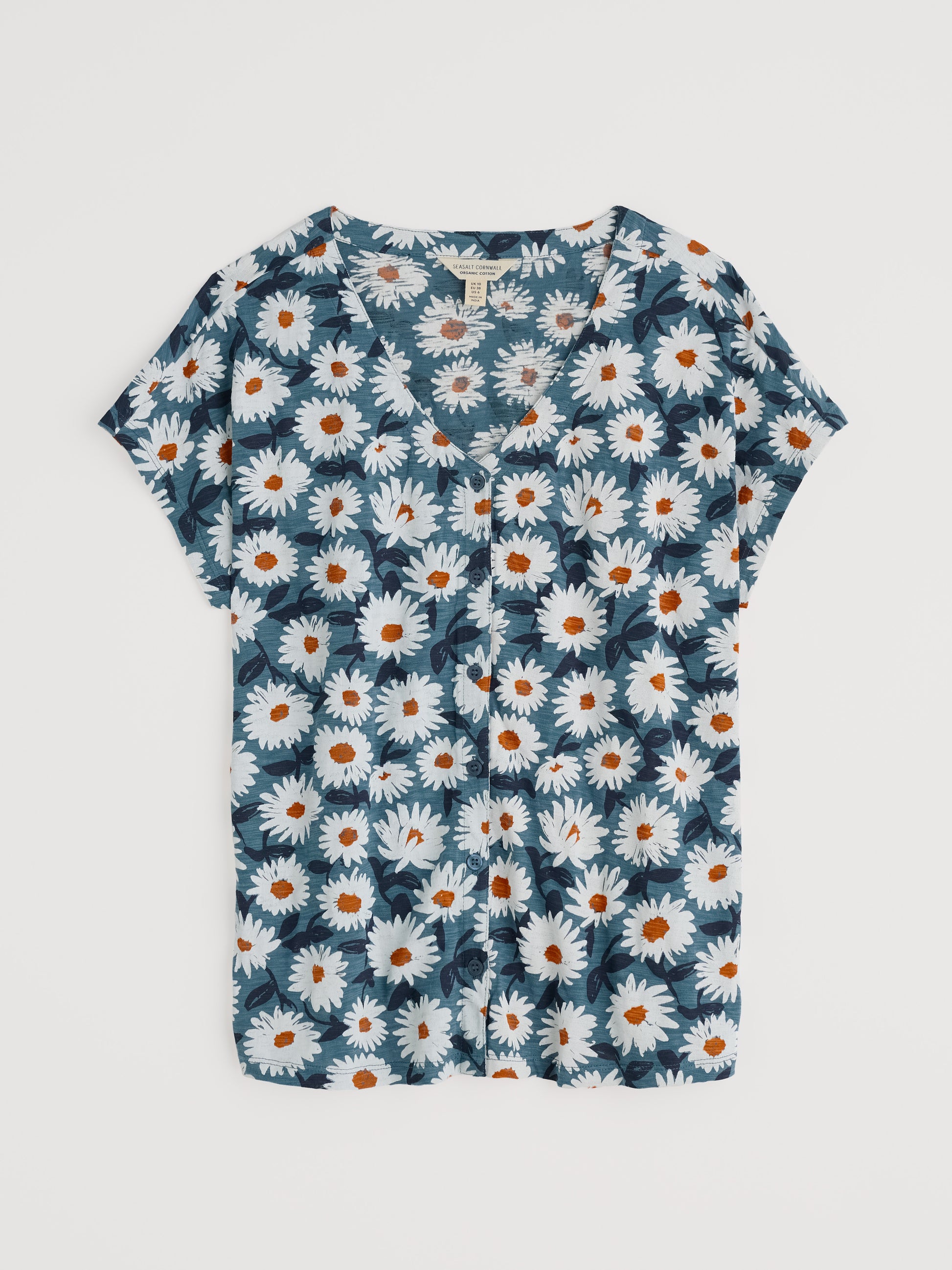 Flat lay of The Studio Glass Top in Artsy Daisy Dusky Jade by SEASALT