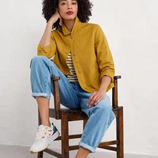 Woman wearing the Coombe Lane Jacket in Chamomile by SEASALT