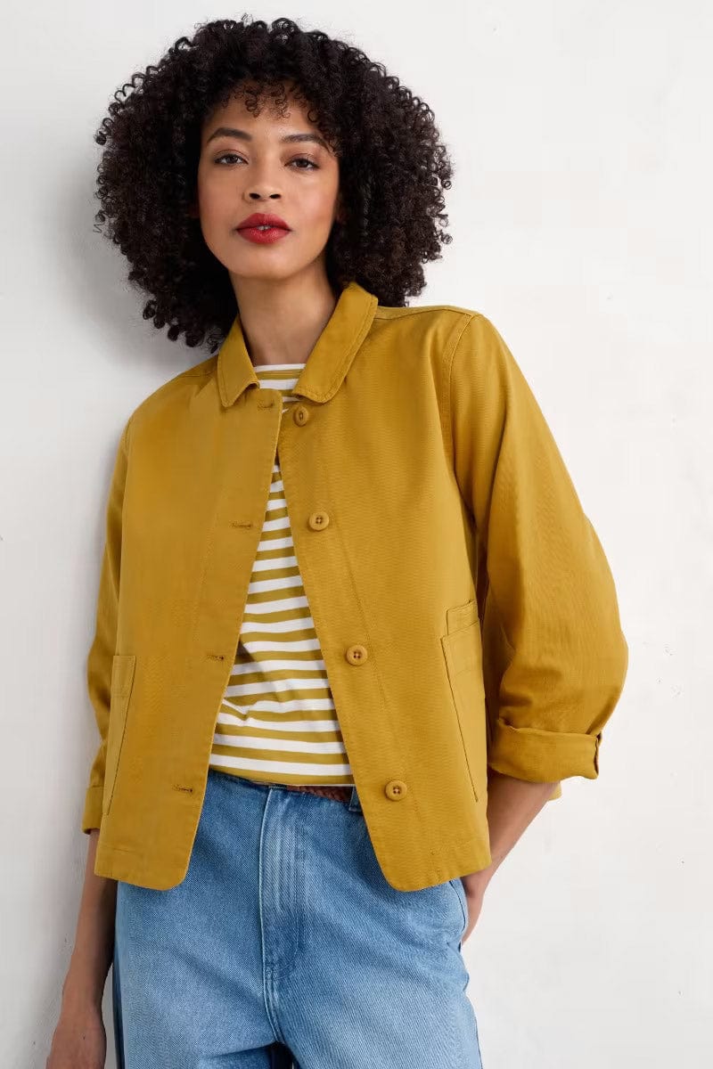 Woman wearing the Coombe Lane Jacket in Chamomile by SEASALT