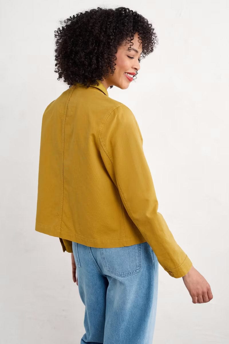 Woman wearing the Coombe Lane Jacket in Chamomile by SEASALT