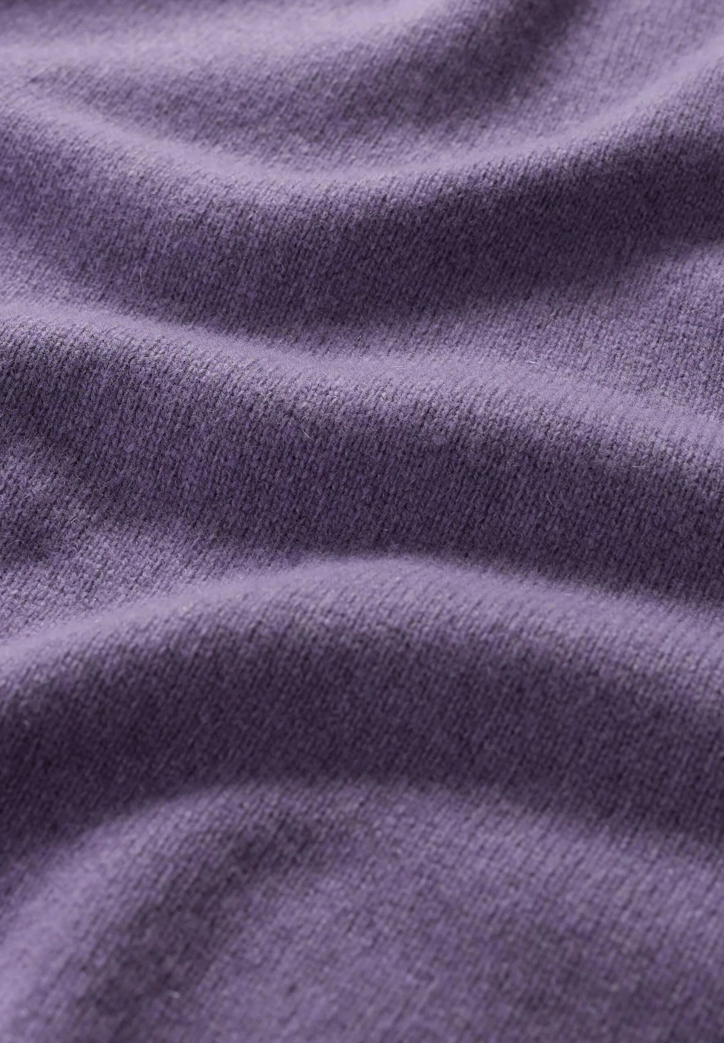 Close up of SEASALT wool knit in purple echium