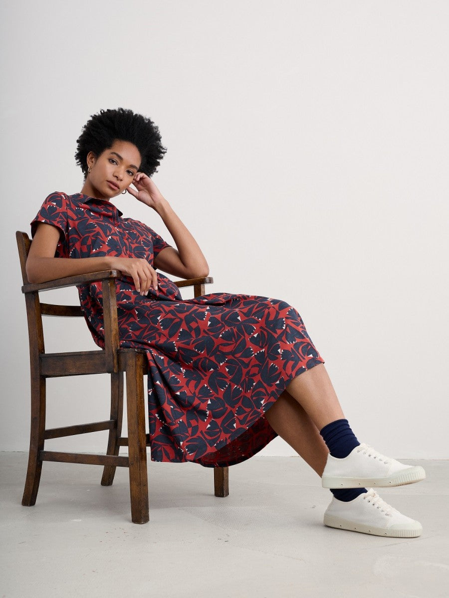 Woman wearing the Mainland Jersey Midi Dress in Floral Cutout Dark Cinnamon by SEASALT