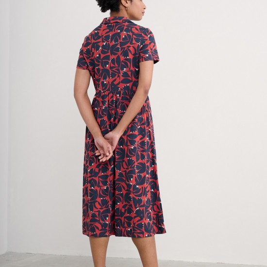 Woman wearing the Mainland Jersey Midi Dress in Floral Cutout Dark Cinnamon by SEASALT
