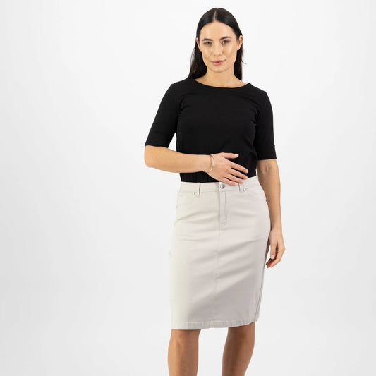 Woman wearing the Lightweight cotton skirt in pumice beige by vassalli
