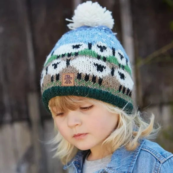 Hand knit sheep beanie for a child.