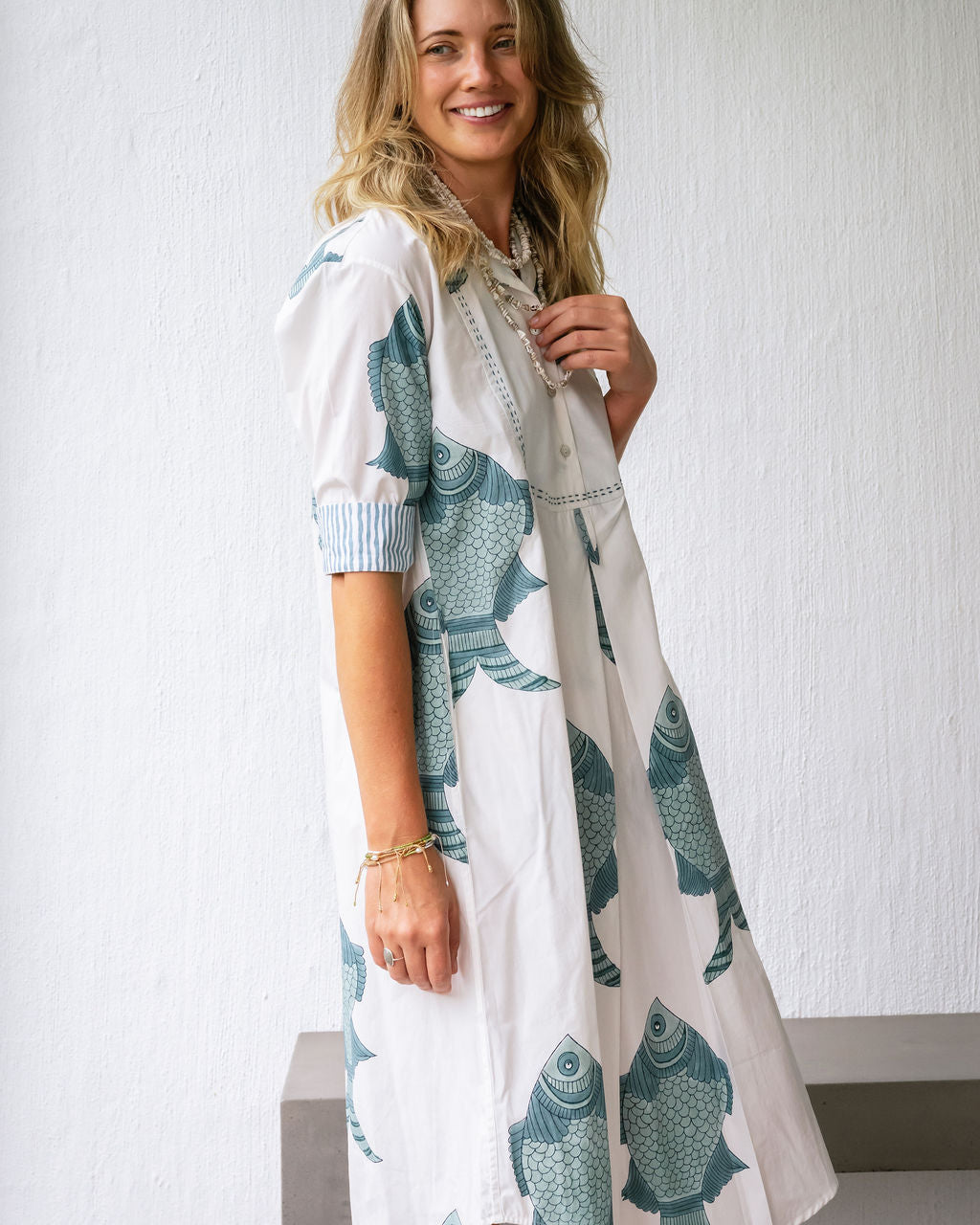 Summer organic cotton dress from Mandalay Designs with big fish design in blue.