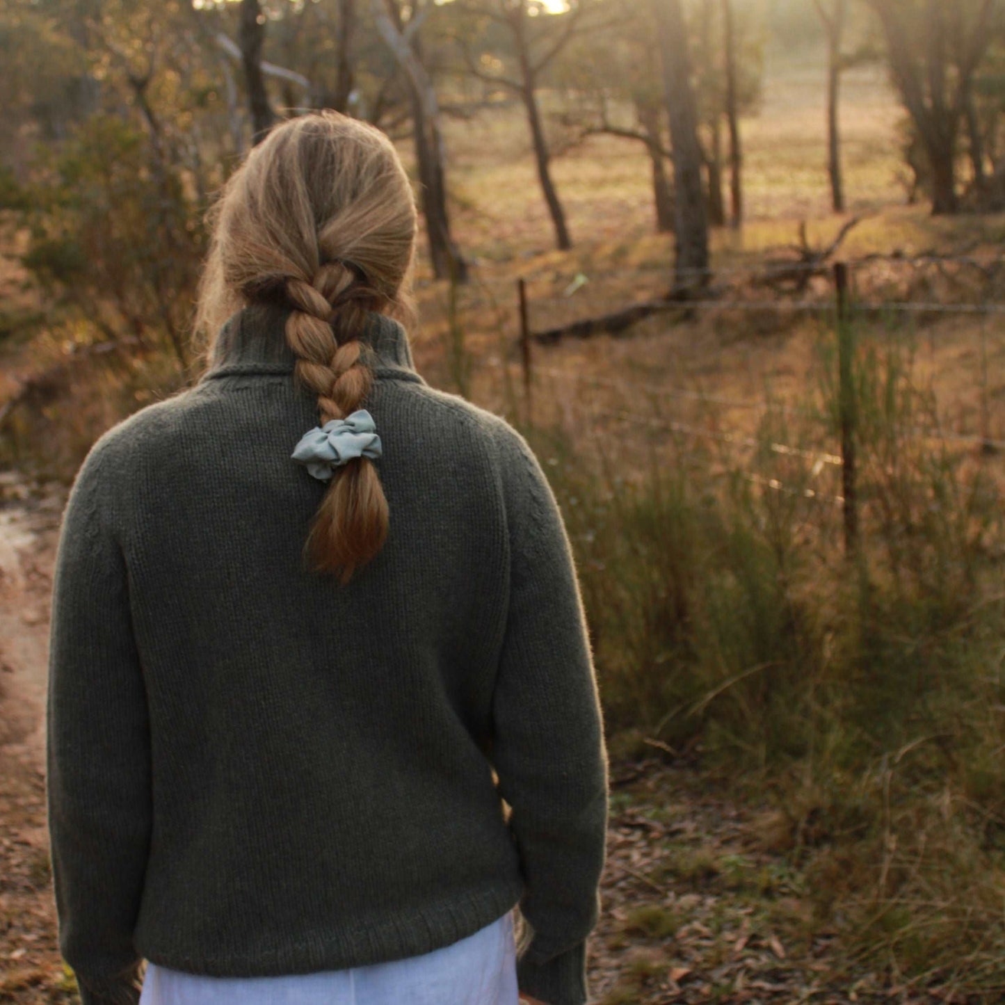A quality chunky Women's Merino Wool Roll Neck Sweater from Harley of Scotland. In Moss