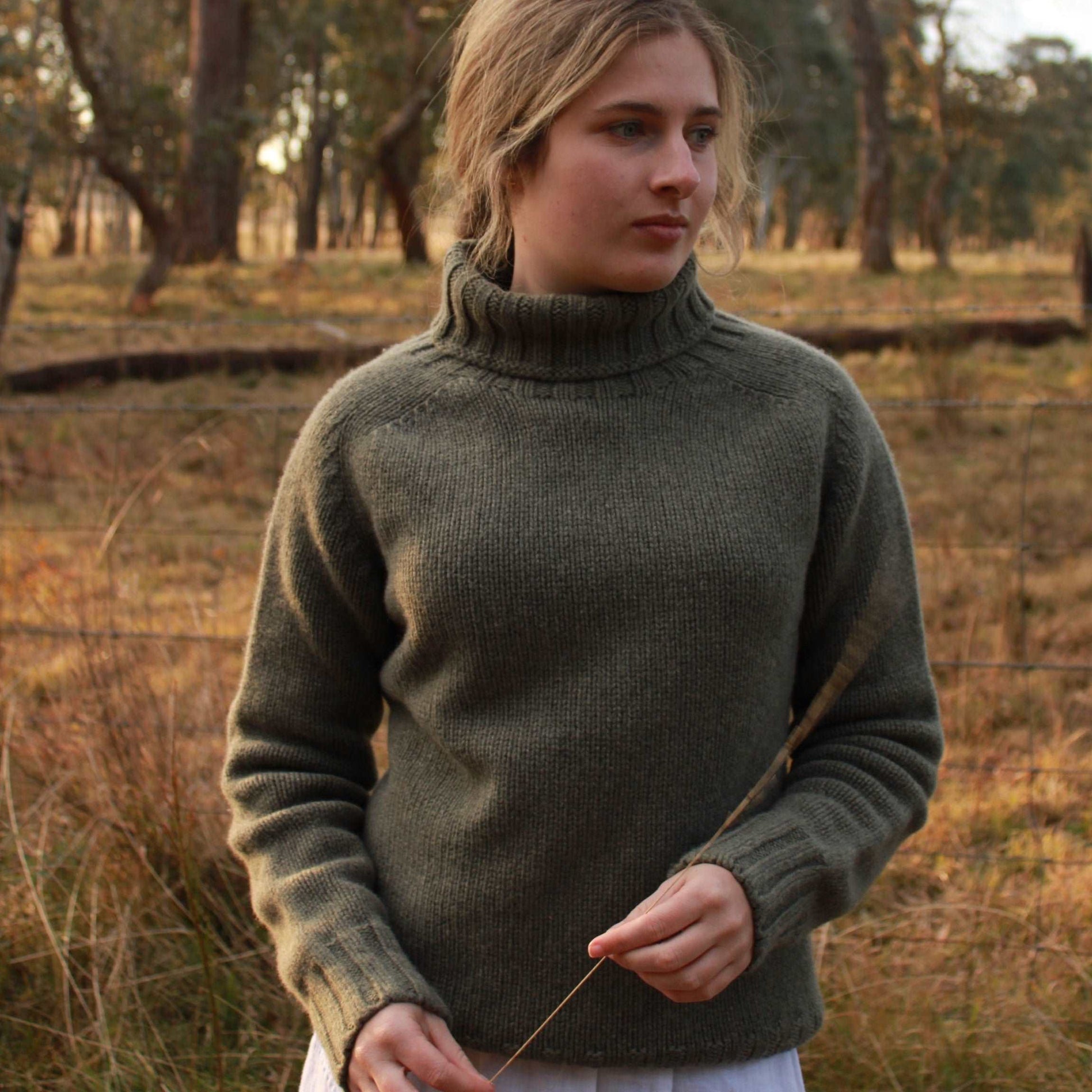 A quality chunky Women's Merino Wool Roll Neck Sweater from Harley of Scotland. In Moss