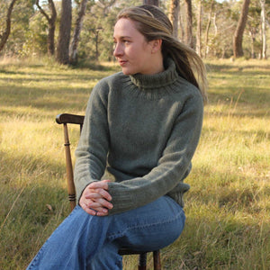 A quality chunky Women's Merino Wool Roll Neck Sweater from Harley of Scotland. In Moss