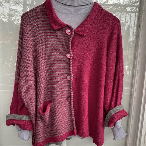Hand Knit from the Orkney Islands made with Raw Silk and Lambs Wool. Cardigan with 1/2 stripe front panel and pocket in Cerise and Dove with the contract colour on the cuffs