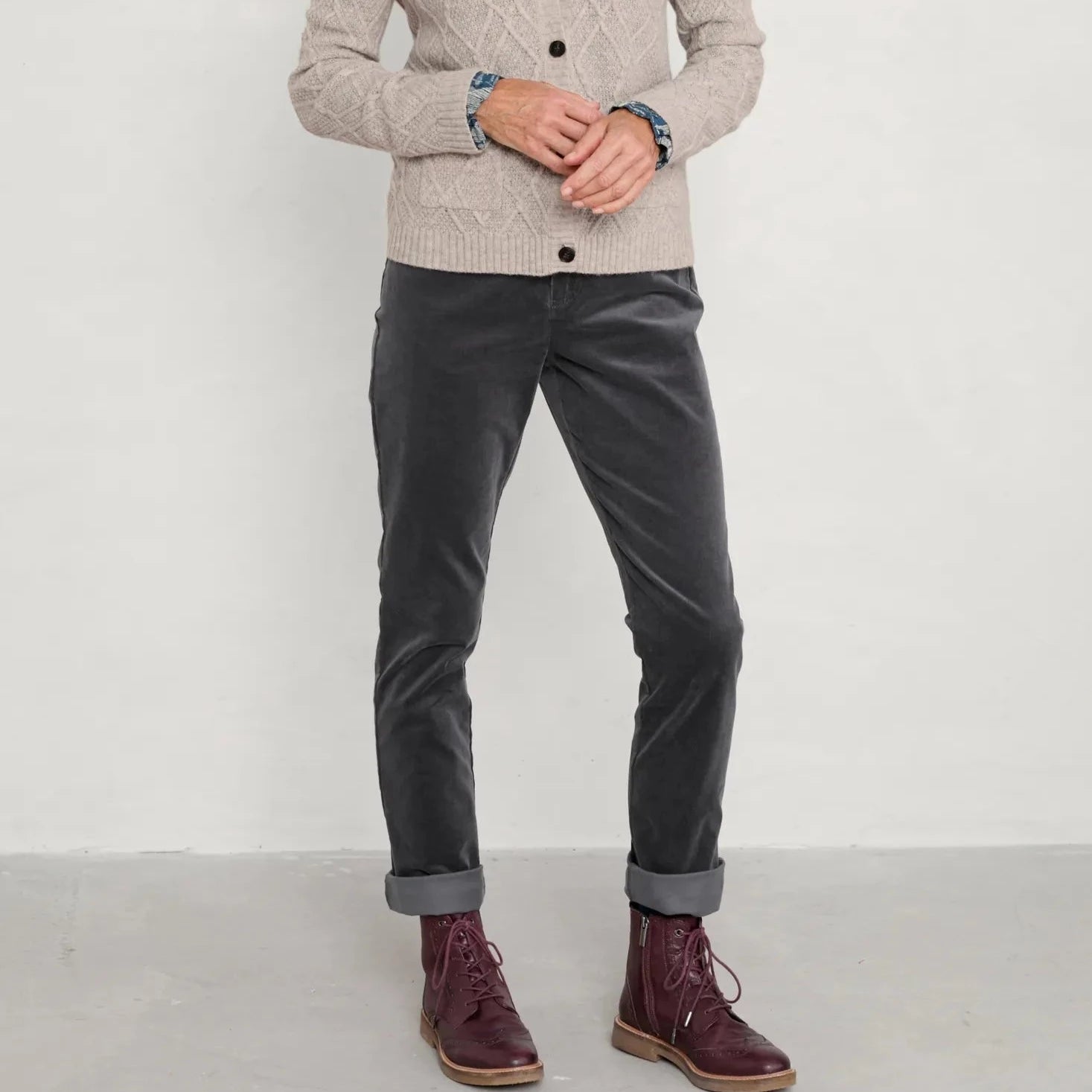 Lamledra Trousers from SEASALT in Coal, worn with boots and a cardigan