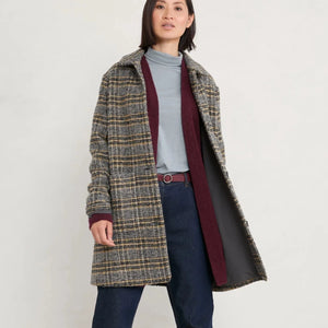 Penmennor Coat in Leah Check Seal Grey from SEASALT, worn with jeans and boots