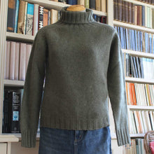 A quality chunky Women's Merino Wool Roll Neck Sweater from Harley of Scotland. In Moss
