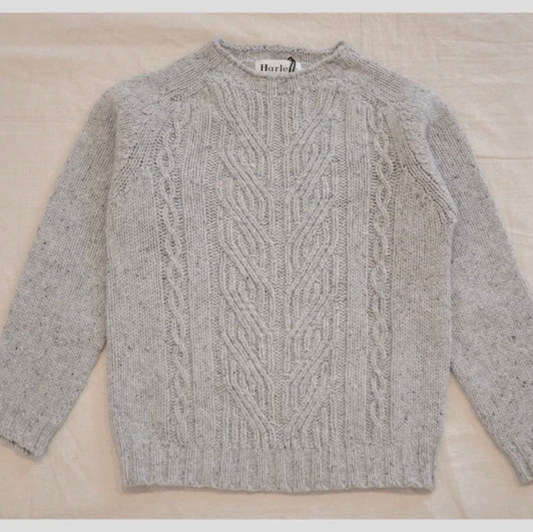 scottish knitwear a cable knit rugged jumper or sweater made from a merino wool donegal tweed yarn