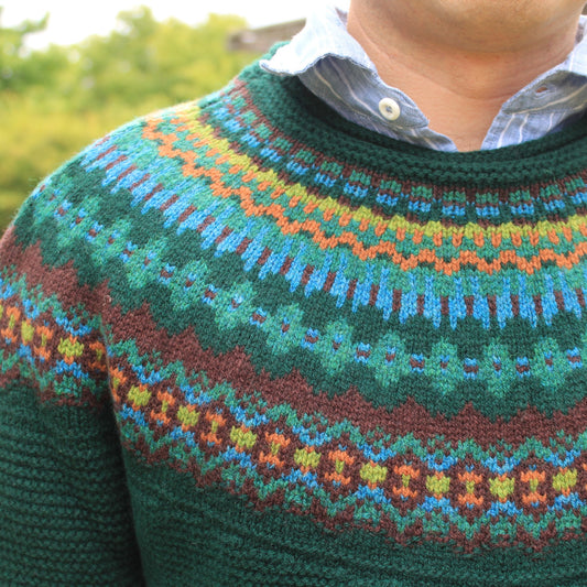 Scottish Knitwear for Men. ERIBE STONEYBREK sweater has a Fair Isle design in Greens. Made from Quality Merino Wool.