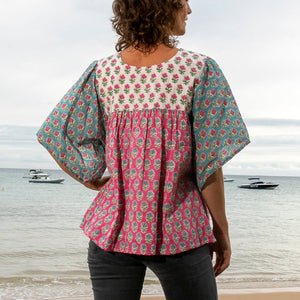 Back view of the Mandalay Designs Patch Top Multi at the beach